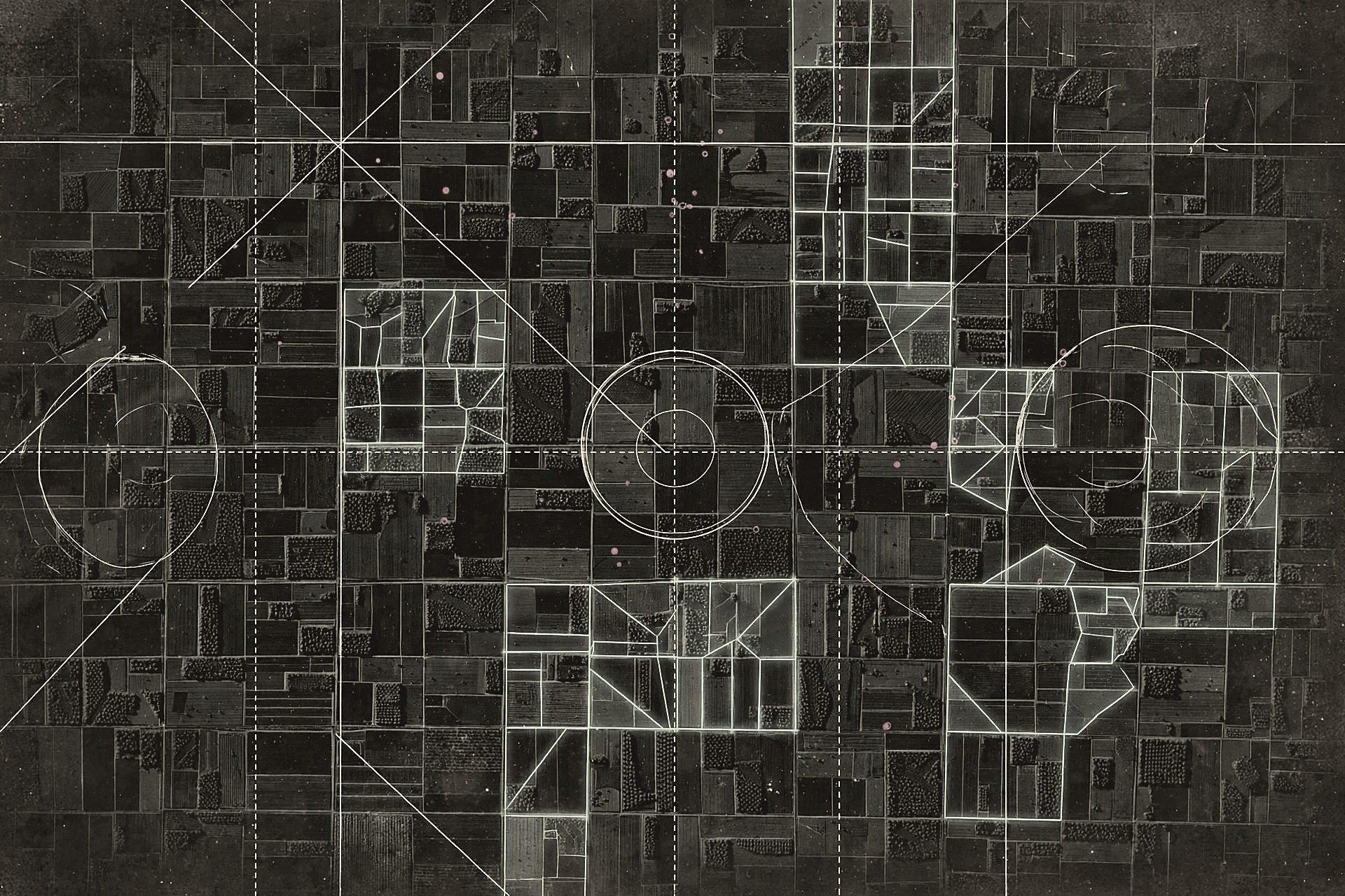 Night satellite view of a farmland grid with teal change-detection polygons and magenta markers on surveyed parcels
